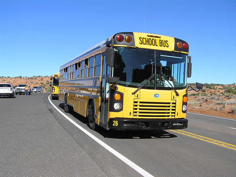 Bus driving down the road